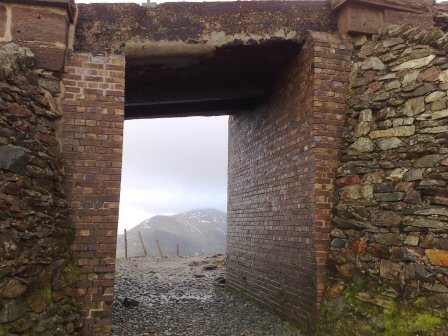 looking Looking towards Glyder Fawr through the railway bridge at Clogwyn