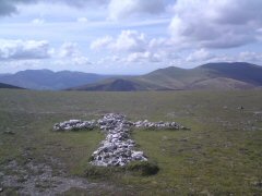 Quartz stone memorial cross by Atkinson Pike